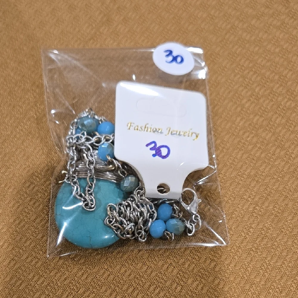 Turquoise and Silver Pendant Necklace